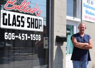 Owner Steve Bullock in front of his business, Bullock's Glass Shop