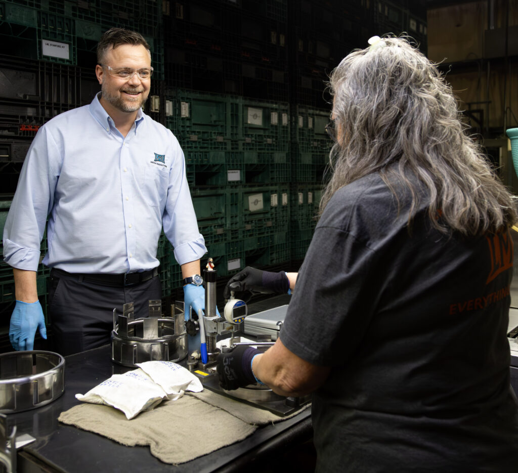 Jordan Dick is pictured talking to an LML employee.